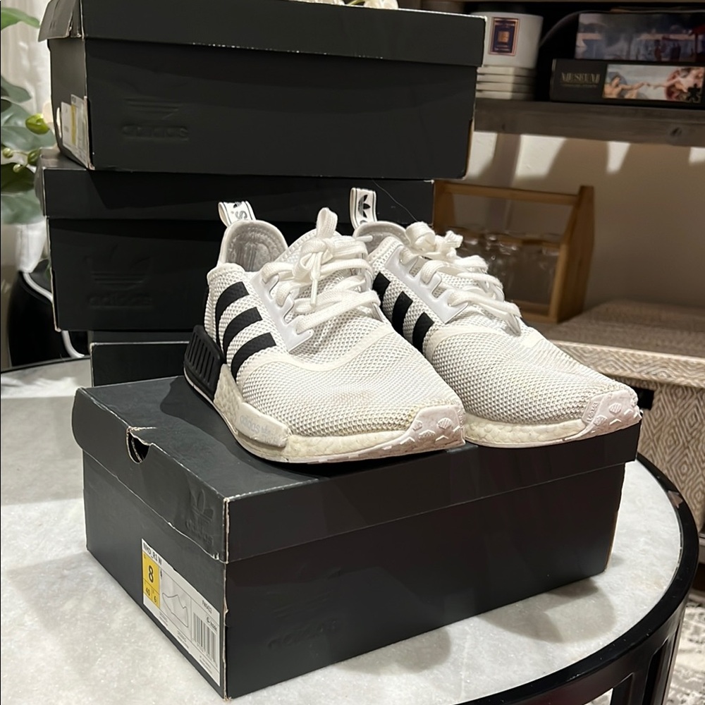 Adidas White and Black Sneakers with Iconic Stripes